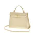 Latte torebka skórzana kuferek z klapką i paskiem crossbody, zdjęcie producenta