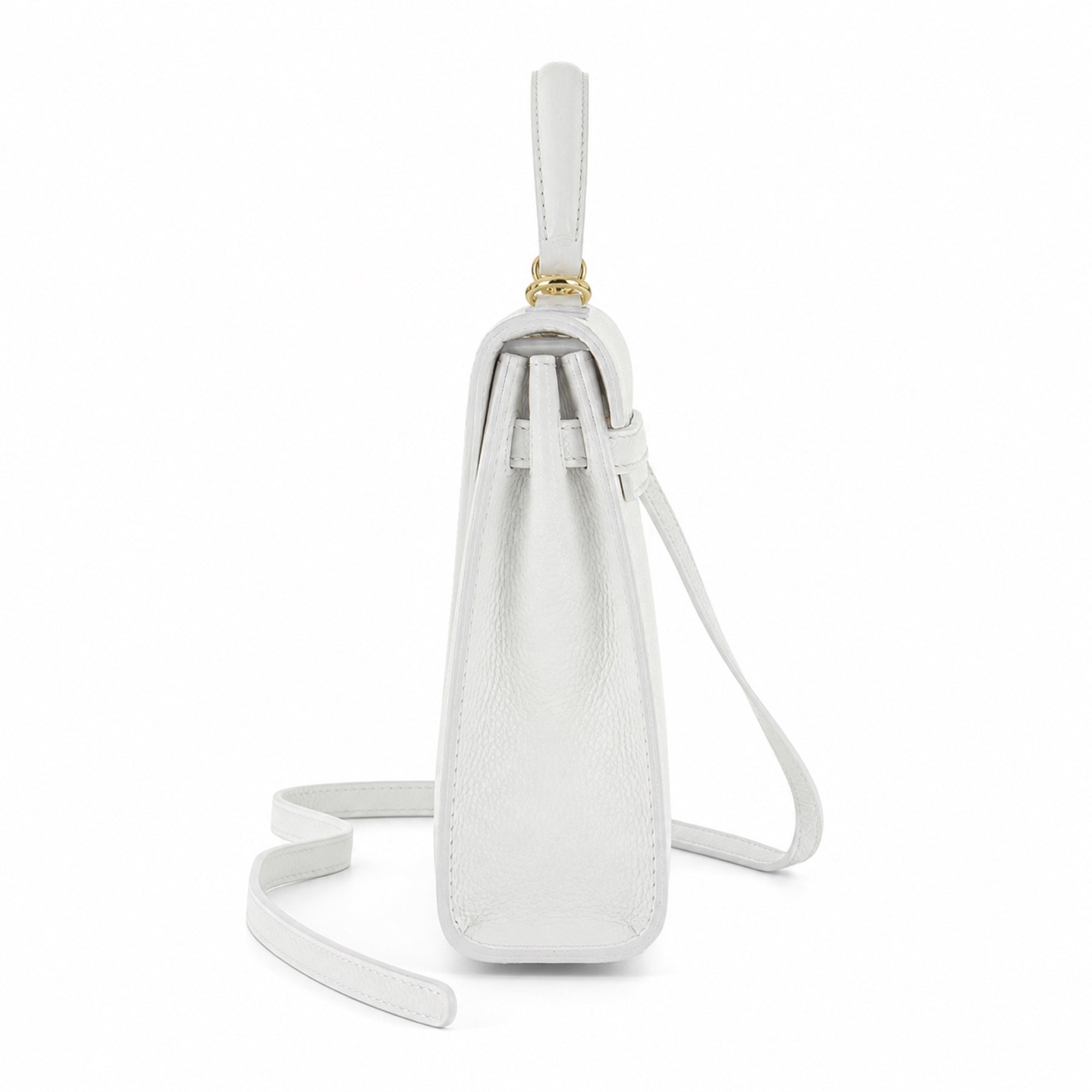 Biały torebka skórzana kuferek z klapką i paskiem crossbody, bok