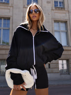 Czarny bluza oversize rozpinana z kontrastowym zamkiem, przód