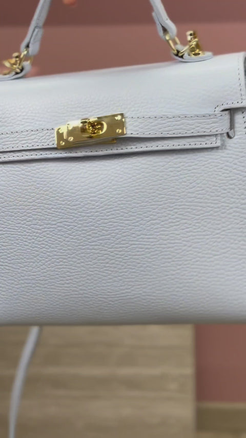 Torebka skórzana kuferek z klapką i paskiem crossbody